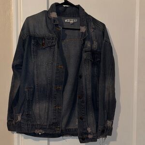 Woman’s Distressed Denim Jacket